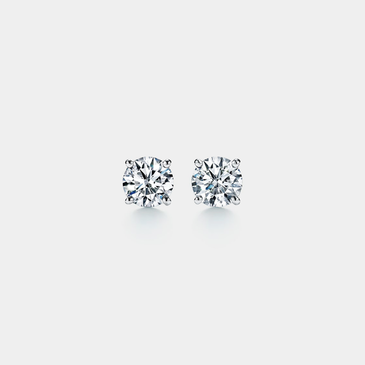Four-Prong Moissanite Stud Earrings in 925 Sterling Silver: 2.0 ct