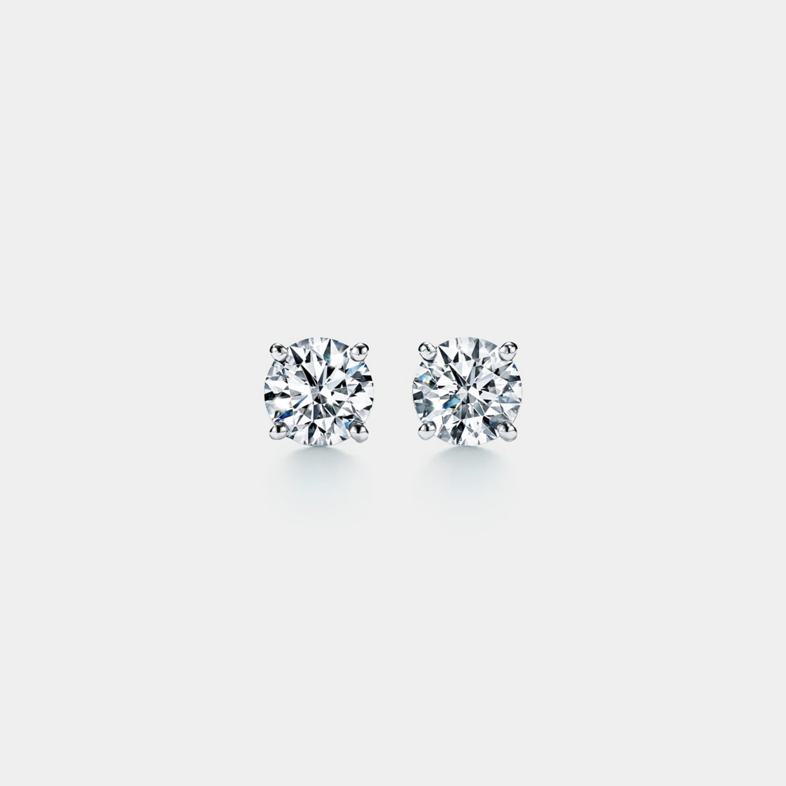 Four-Prong Moissanite Stud Earrings in 925 Sterling Silver: 2.0 ct