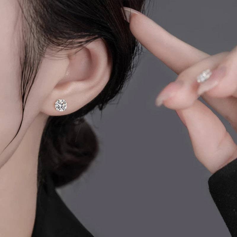 Four-Prong Round Moissanite Earrings in 925 Sterling Silver: Silver / 2.0 ct